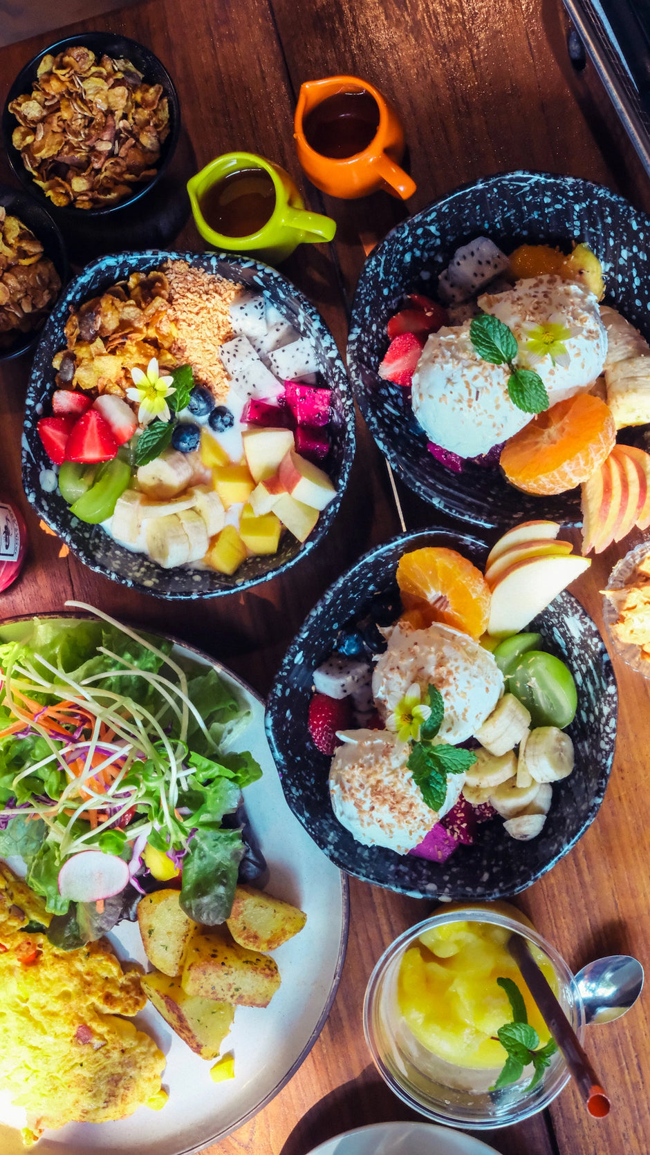 Fresh, nourishing retreat meals with fruit bowls, homemade granola, salad, potatoes, and wholesome dishes served daily